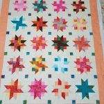 Fire and Ice Ribbon Star Quilt Layered and Batted
